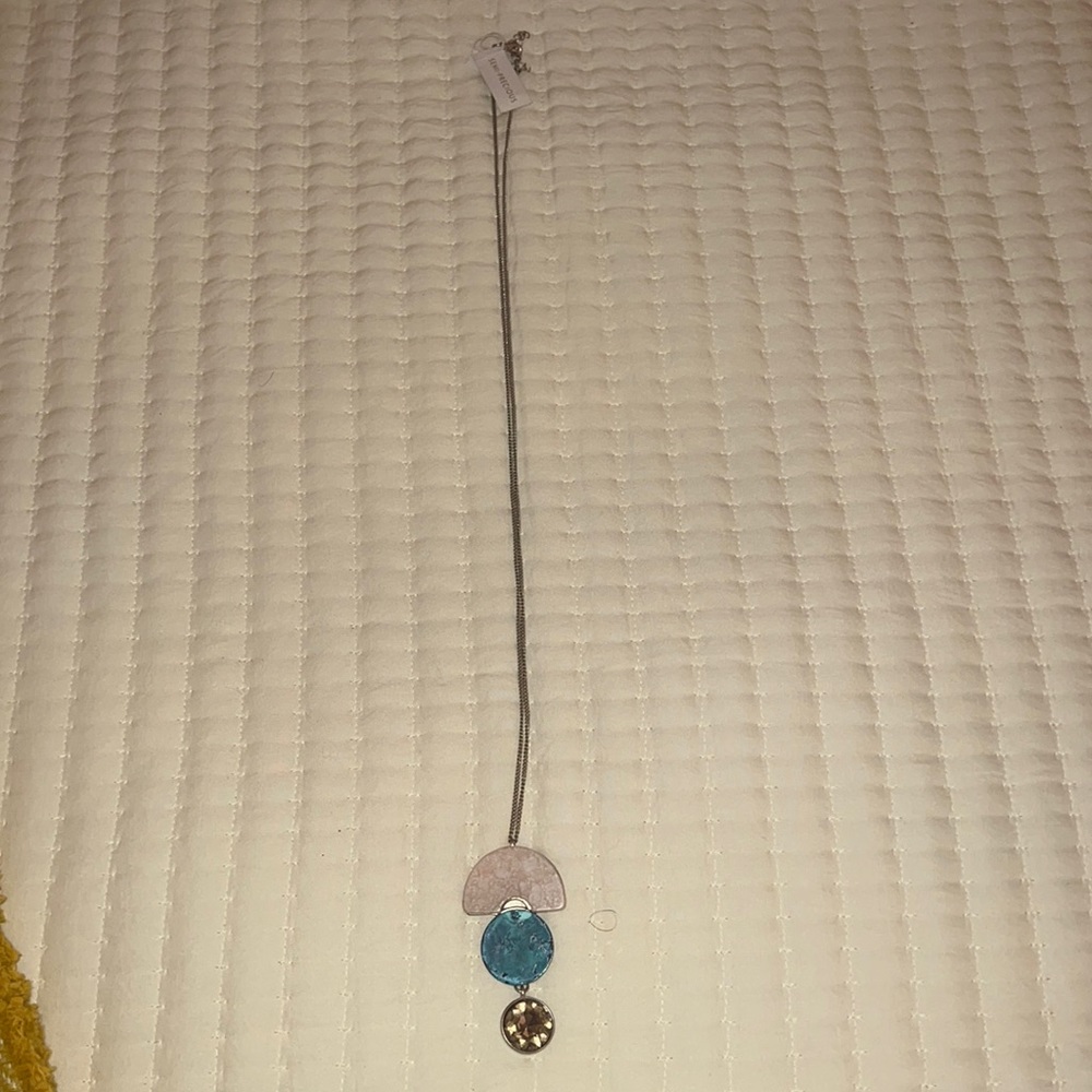 Long necklace with teal/ gold center